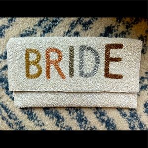 BRIDE beaded clutch/shoulder bag, used once.  Comes with gold shoulder strap